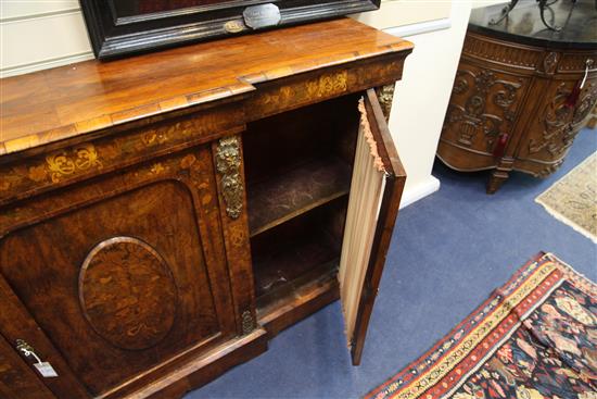 A 19th century French walnut and marquetry breakfront side cabinet, W.5ft 11in. D.1ft 2in. H.3ft 6in.
